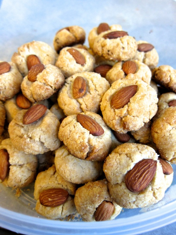 Chinese almond cookies in a plastic container